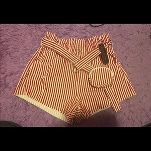 New high rise shorts with belt and pouch size medium